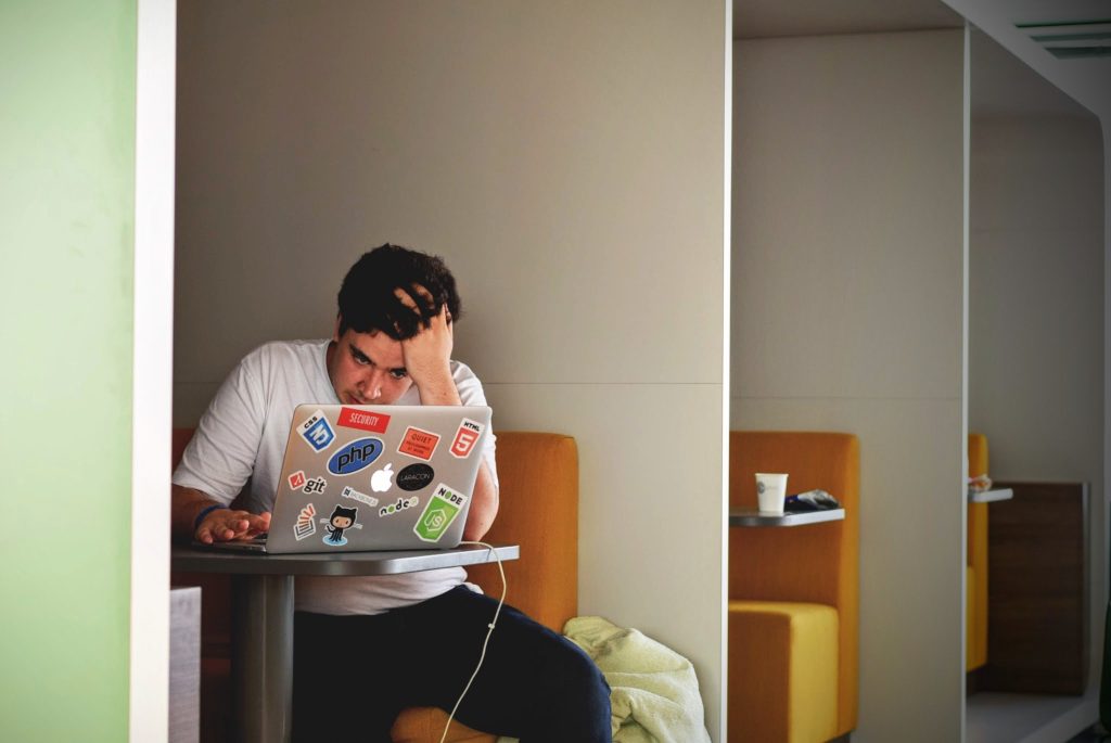 Stressed out person - How to Stop Procrastinating and Study Featured Image