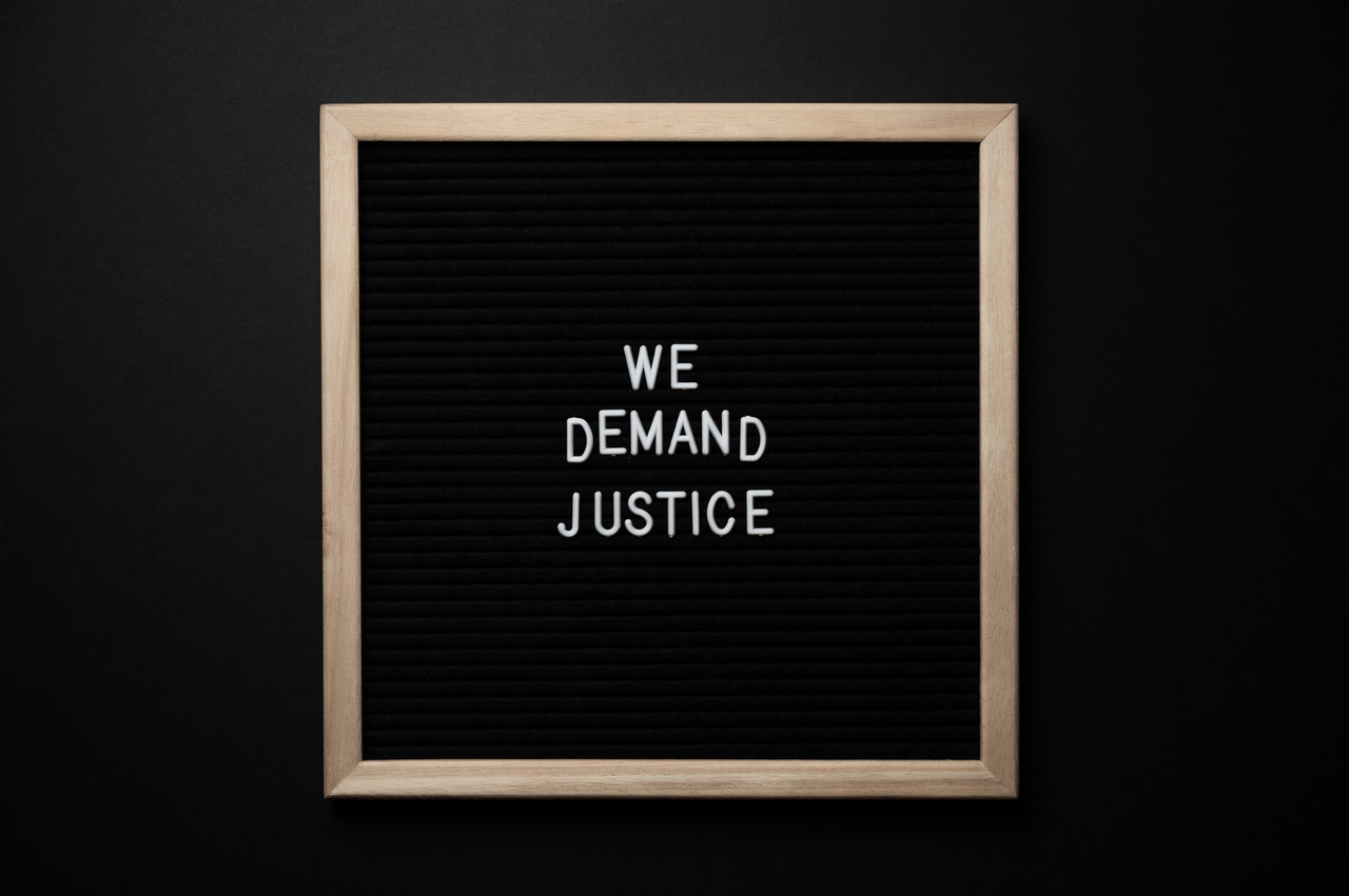 We demand justice sign - blade runner quotes
