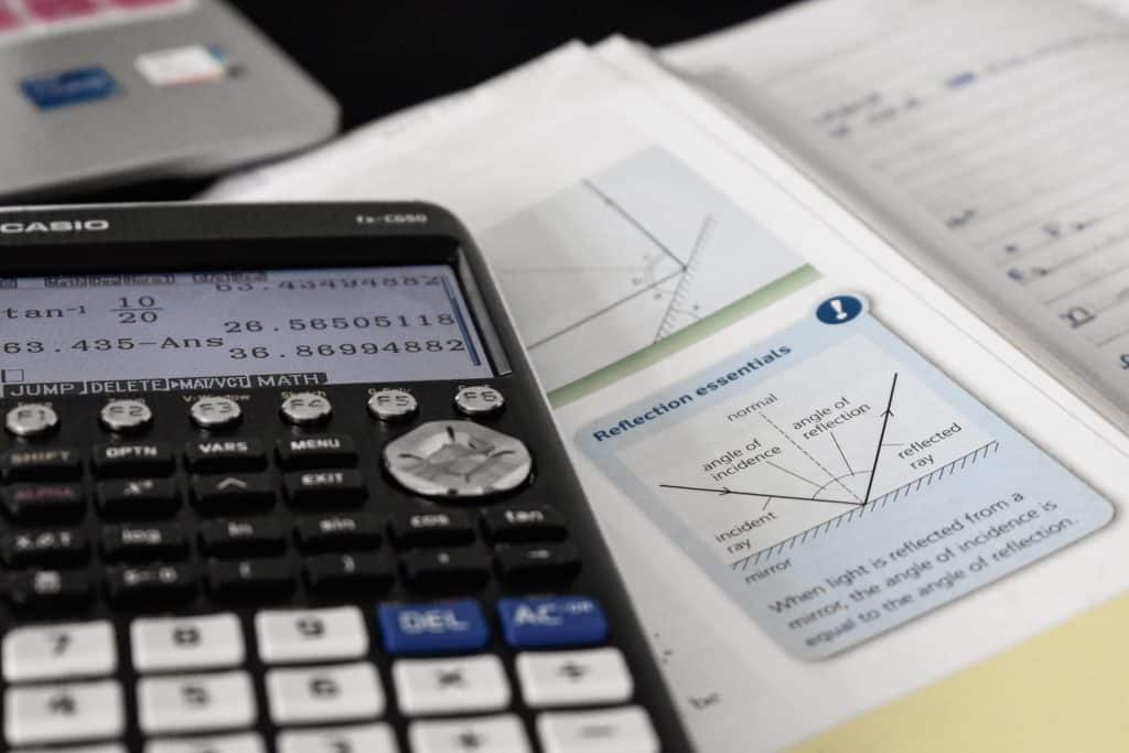 Maths textbook and calculator - QCE Maths Methods Practice Exam