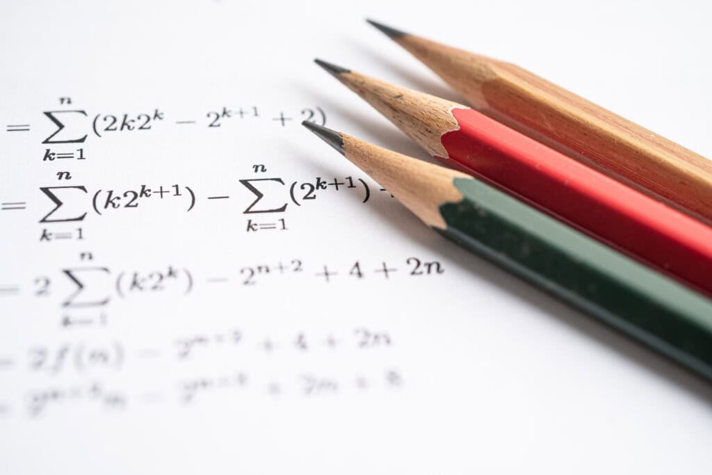 Pencil on mathematic formula exercise test paper - VCE Maths Methods exam