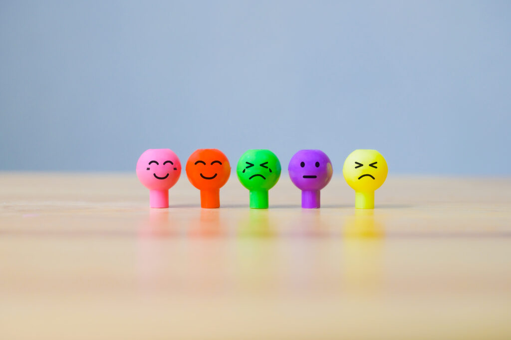 Emotions face miniature colourful. Happy smiley and sadness emotional - Emotive Language